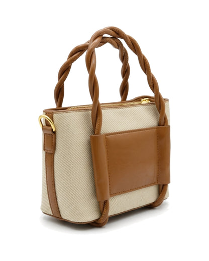 TKN Twist — Cream / Tan — upright tote silhouette — front three-quarter view