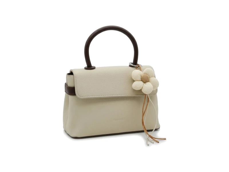 Blossom handbag with a flower charm and round handle